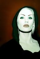contrasting portrait of a woman with bright makeup