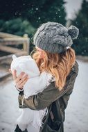 young Mother with Baby at winter, outdoor