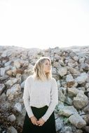 Woman against the rocks