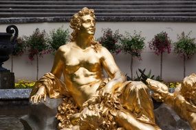 gilded sculpture of nymph in linderhof palace