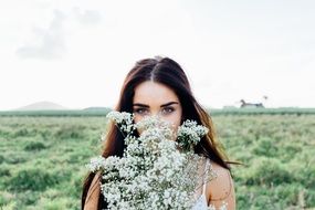 Young Woman with Flowers Bouquet