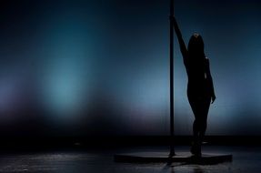 silhouette of a ballerina in the dark