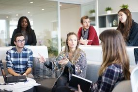 Business Team, young people communicating in office