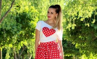 seductive woman with heart on t-shirt