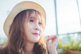 young vietnamese woman in hat