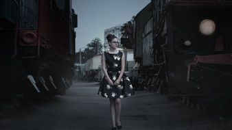 girl at the train station at dusk