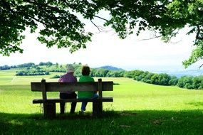 Women relax on the bench