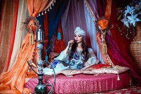 photo of eastern girl with a hookah