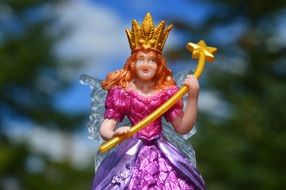 figurine of a bright princess in a gold crown