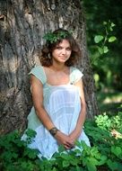 beautiful woman in summer forest