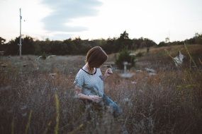Woman walking on Meadow at summer