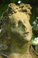 damaged Stone statue, woman's head
