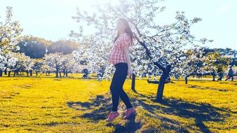 pregnant woman in the spring garden