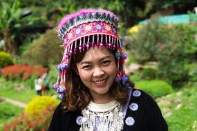 young girl in national costume in Thailand