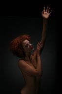 Naked woman with red hair