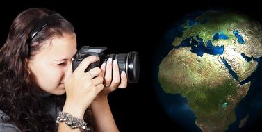 photographer girl taking pictures of the globe