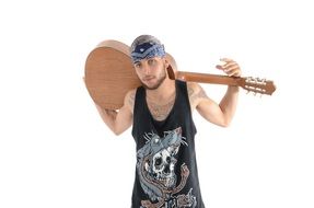 a young man with a guitar