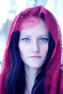 Woman with Blue Eyes in the colorful cape