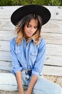 girl in jeans and hat