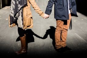 couple with holding hands