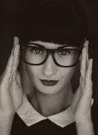 portrait of a brunette in glasses