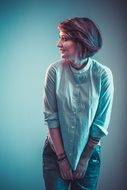 model in studio in shirt and jeans