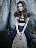 beautiful girl on a tree