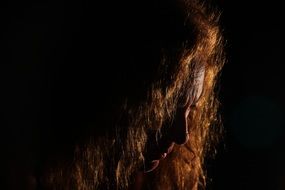 sad girl in black background