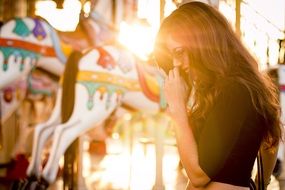 girl posing at the solar carousel