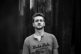 black and white photo of a handsome young man