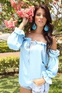 Woman in Blue with Flower