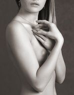 naked girl with hands at breast
