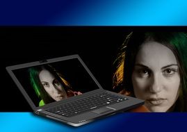 laptop monitor with a model face an illusion