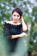 photo of a girl in an openwork black dress