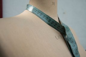 seamstress tape on mannequin
