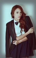 young red haired girl in black Coat