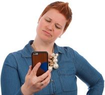 woman with short red hairs making selfie