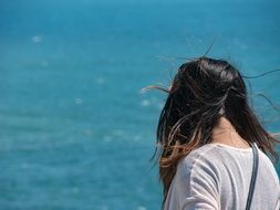 girl on the beach near the ocean