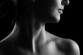 Black And photo of girl's neck