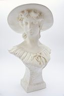 sculpture of a woman in a hat