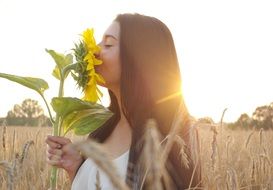portrait of a woman with sunflower