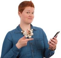 woman pointing at phone