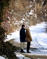 elderly people on a walk in the winter Park