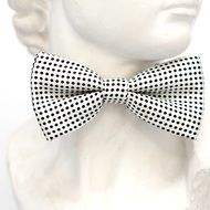 white bow tie in black dots