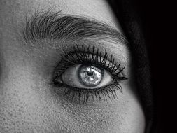 Woman’s eye close up, black and white