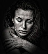 black and white portrait of a young pensive woman