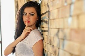 girl model posing near the wall