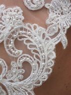 White beads on a Wedding Dress