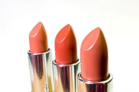 light brown lipstick on white background