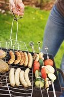 grilled meat sausages and vegetables